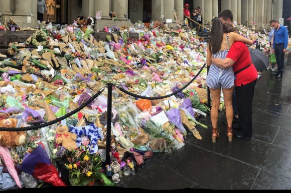 People leave tributes in Bourke Street Mall in January 2017.