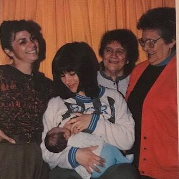 Thorpe with her baby son in a 1990 pamphlet encouraging Aboriginal women to breastfeed. With her are (from left) her mum Marjorie, her grandmother Alma, and greatgrandmother Edna Brown.