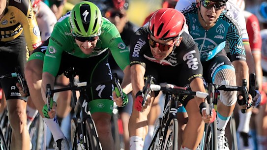 Caleb Ewan, right, goes to wheel to wheel with Ireland's Sam Bennett at the end of stage 11.