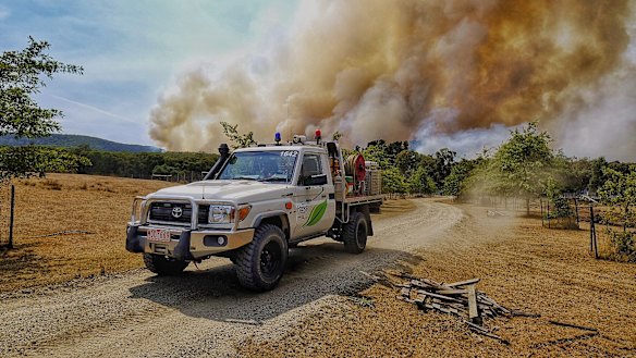 Firefighters battling the Bunyip State Park fire near Gembrook on Sunday.