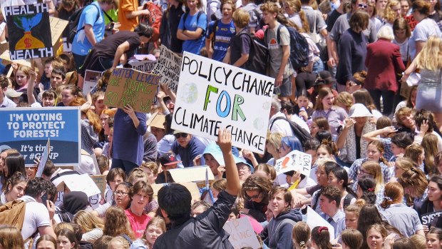 Students protesting on Spring Street on Friday.