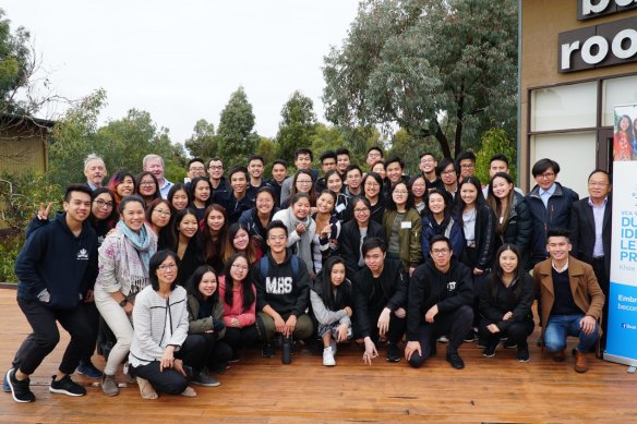 Members of the DILP. Jasmine Nguyen, front row, second from left; Grandpa Dinh, far right, standing; Anthony Tran,
back row, 10th from the left.