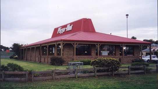 The iconic Pizza Hut red roof, though this example lacks the trapezoid windows.