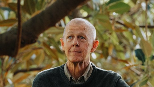 Dr Brett Summerell, chief botanist at the Royal Botanic Garden, within the canopy of a threatened fig.