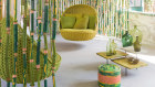 Paola Lenti’s ‘Orbitry’ swing seat and ‘Bamboo’ room divider.