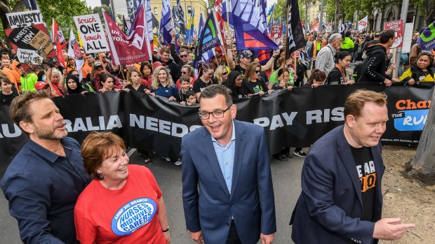 Tens of thousands of people march through the streets of Melbourne in support of the Change the Rules campaign in 2018. Victorian Premier Daniel Andrews led the march.