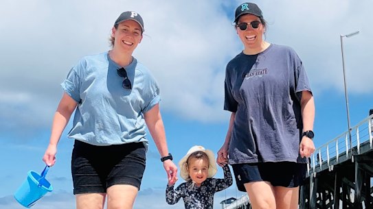 Lauren Arnell and her wife Lexie Edwards with their daughter Marlie.