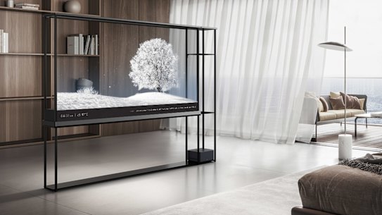 LG’s Signature OLED T is translucent, until an internal curtain is pulled up to make it black.