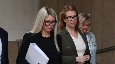 Elaine Stead, centre, and her sister Olivia, right, outside the Federal Court in Sydney on Wednesday.