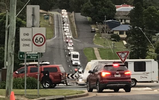 Cars backed up to Eden, about 40 kilometres north of the NSW-Victorian border, at 8pm on New Year's Eve.