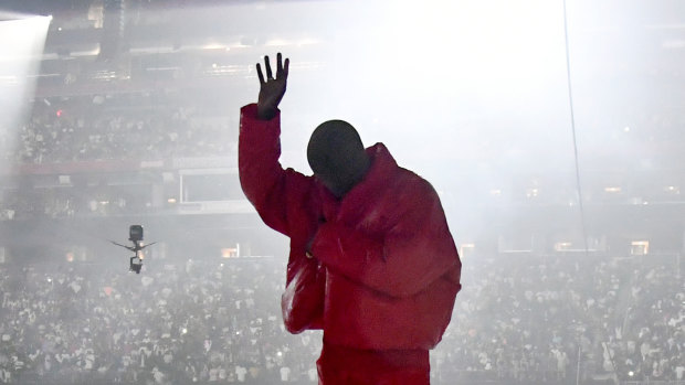 Kanye West onstage during a Donda listening event in July.