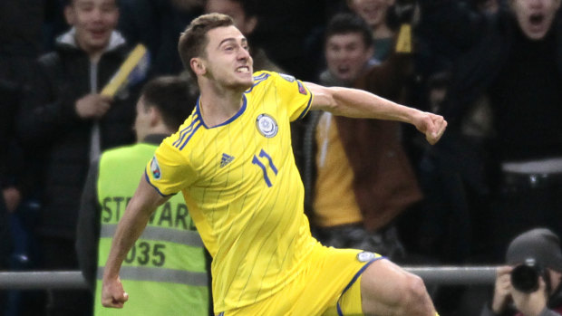 Jubilation: Yan Vorogovskiy celebrates after making it 2-0 for Kazakhstan against Scotland.