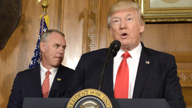 US Secretary of Interior Ryan Zinke (left) with Donald Trump in April last year.