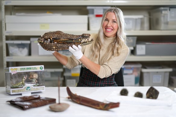 Queensland Museum Senior Curator, Queensland Stories,
Dr Elizabeth Bissell, with some objects in Croc! Lost Giants to Living Legends.