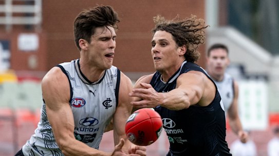 Carlton star Charlie Curnow (right), with Lewis Young.