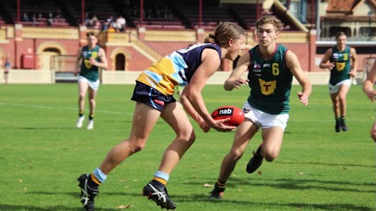 Bendigo's Jack Ginnivan (with ball in hand) hopes for a double celebration on December 9.