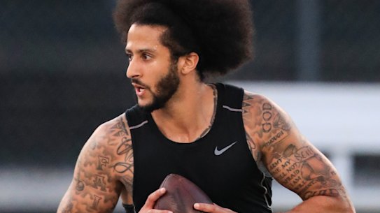 Still got it: Kaepernick lines up for a pass during his live-streamed audition.