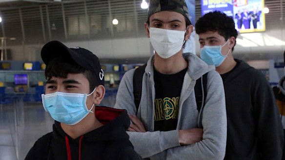 Unaccompanied children refugees from the overcrowded migrant camps on the north Aegean Sea islands, Greece, walk towards the gates of the Eleftherios Venizelos International Airport in Athens to travel to Luxembourg.
