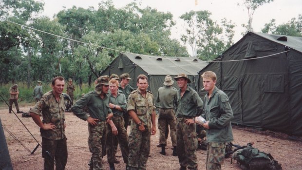 Todd Berry, centre, facing the camera, with fellow soldiers in the Northern Territory, 1992.