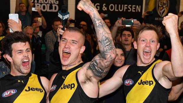 Tigers players celebrate their 2017 preliminary final win over GWS.