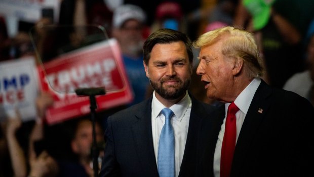 Donald Trump with J.D. Vance at Saturday’s (Sunday AEST) campaign rally at Grand Rapids, Michigan.