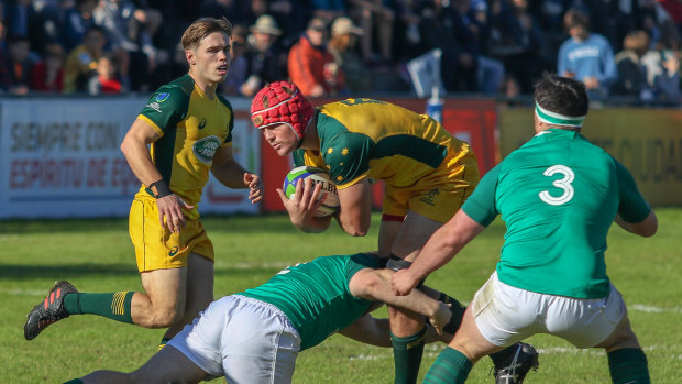 Harry Wilson takes the ball into contact as Will Harrison look on in Australia's 45-17 win over Ireland in the pool stages. 