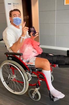 Connor Watson in a wheelchair after surgery on his ruptured patella.