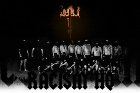 The National Socialist Network neo-Nazi group burning a cross.