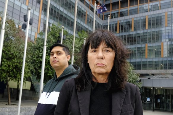 Uber drivers Syed Mubashir and Debra Weddall outside the Federal Court in Melbourne.