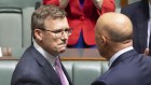 Alan Tudge in parliament alongside Opposition Leader Peter Dutton moments after quitting politics.