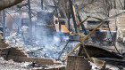 A house still smouldering after fires swept through parts of Oklahoma at the weekend.  