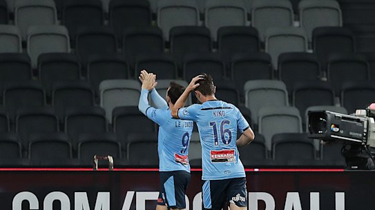 Sydney goalscorer Adam Le Fondre applauds to the empty stand at Bankwest Stadium.