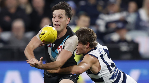 Holding the ball interpretation under fire from Cats coach as he bemoans advantage decision