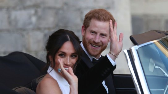 Harry and Meghan wave goodbye.