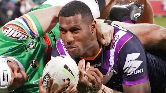 Melbourne Storm's Suliasi Vunivalu, right, has been linked with a move to rugby union. 