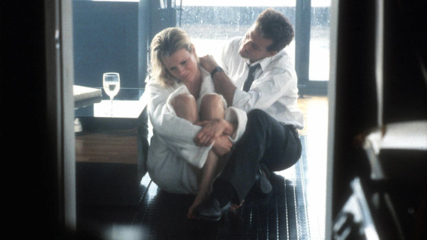 Kim Basinger and Mickey Rourke in 9½ Weeks (1986).