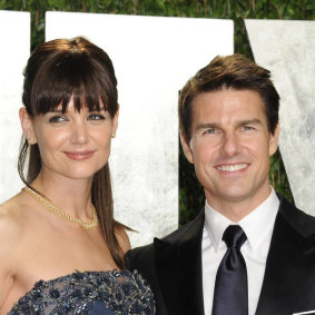  Tom Cruise and Katie Holmes arrive at the Vanity Fair Oscar party in 2012.