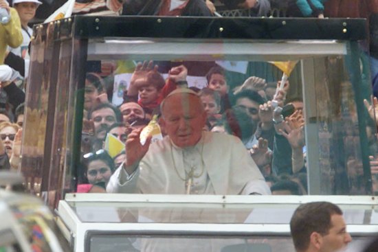 Pope John Paul II, pictured in his famous popemobile.