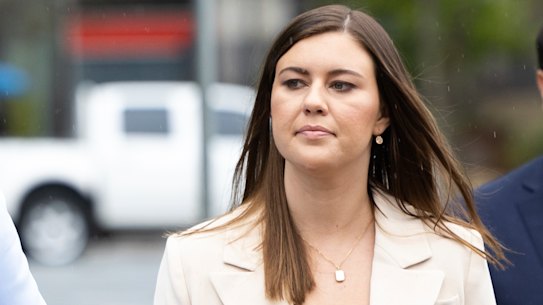 Brittany Higgins (centre) arrives at the ACT Supreme Court in Canberra on Wednesday.