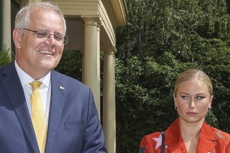 Prime Minister Scott Morrison with 2021 Australian of the Year Grace Tame this week. 