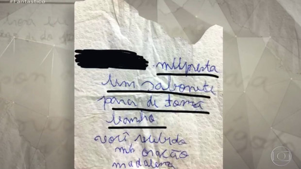 A misspelt note shown by Globo's Fantastico program said to have been written by Madalena Gordiano, who did not finish her education, to a neighbour. It reads in Portuguese: "Lend me soap to shower. You'll receive a prayer. Madalena"