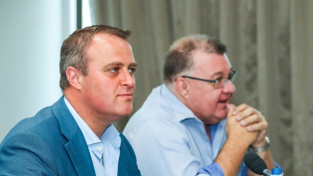 Liberal MPs Tim Wilson (left) and Craig Kelly (right) at a public hearing of the franking credits inquiry. 
