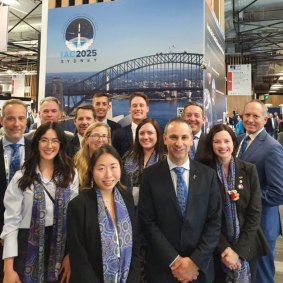 Sydney’s winning bid team at the Paris 2022 International Astronautical Congress on Thursday.