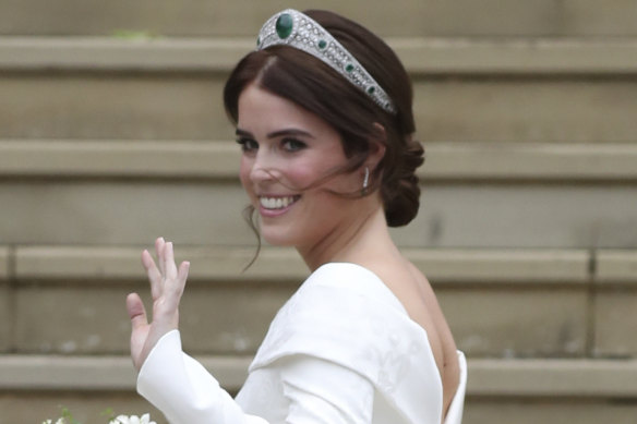 Princess Eugenie arrives for her wedding ceremony to Jack Brooksbank at St George’s Chapel, Windsor Castle, wearing the Greville Emerald Kokoshnik Tiara.