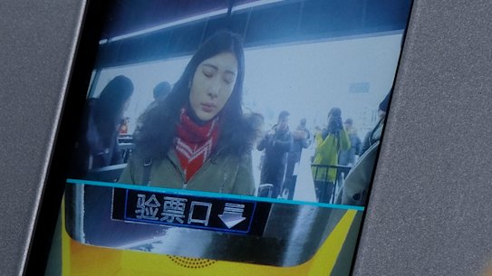 Ticket checking machine with facial recognition technology.
