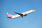 Virgin drops Economy X upgrades to as little as $8 per person. 