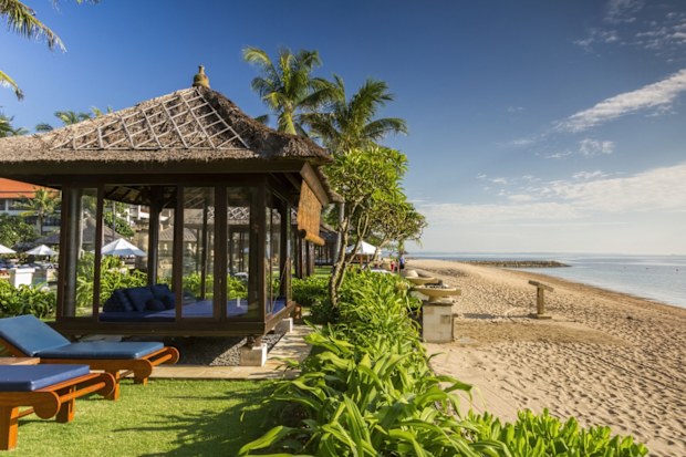 Luxurious bungalows of a resort facing the sea, Bali, Indonesia.