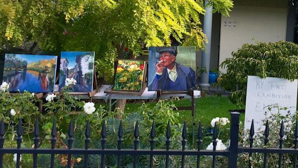 Heather has set up an exhibition of her are in her own front yard for passersby to enjoy.