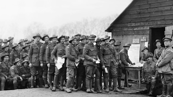 Members of the 44th Battalion cast their ballots in the 1917 conscription referendum on the Western Front.