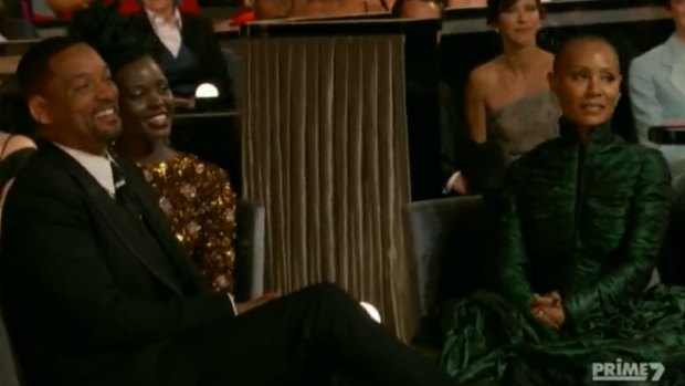 The look before The Slap. Jada Pinkett Smith was less than impressed with Chris Rock’s jokes about her hair.